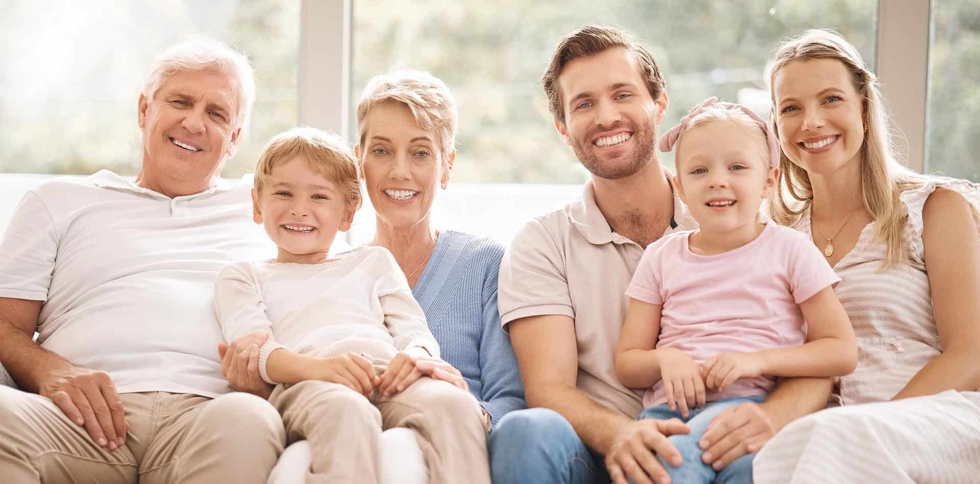 australia, big family and portrait smile on sofa relaxing in hap
